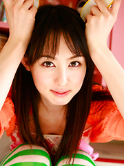 Rina Akiyama Asian in long colorful socks enjoys some sweets